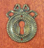 Escutcheon